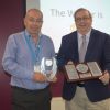 Peter Sullivan, right, receiving his award from John Golding, East Devon's Strategic Lead for Housing & Environment