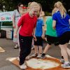 Children doing group art project with their feet