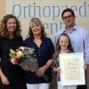 Rhiannon and Michelle with Helen Challinor (left), Advanced Orthopaedic Spine Practitioner, and Oliver Stokes, Consultant Spinal Surgeon 