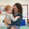 Westbank's Kidzone Childcare Manager Lucy Elliott with one of the toddlers