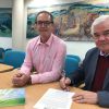 Teignbridge's Managing Director Phil Shears, left, and Council Leader Cllr Gordon Hook sign the Devon Climate Declaration 