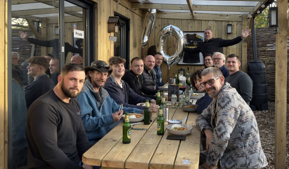 Group of people enjoying a meal