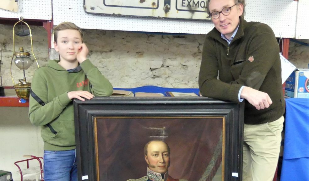 Boy and father with painting