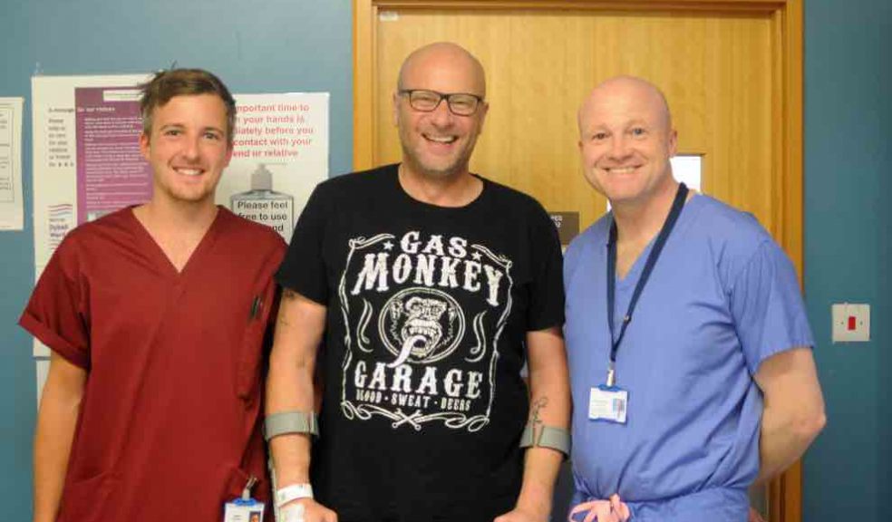 (L-R) Jonny Ritchie, Physiotherapist; Christopher Bennett and Matthew Wilson, Consultant Orthopaedic Surgeon.