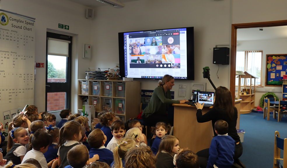 Reception class at Broadclyst Community Primary School connecting online with a school in India