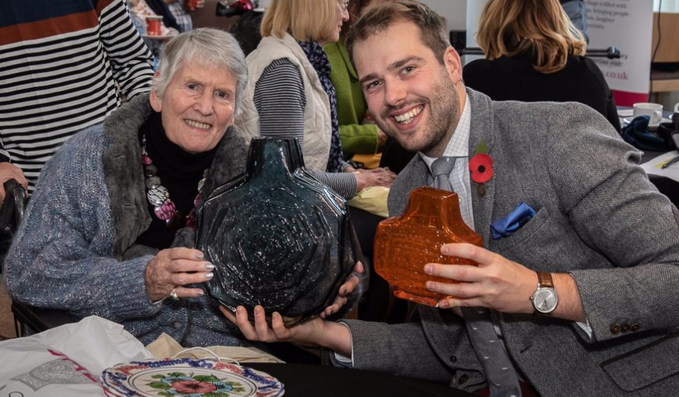 Timothy Medhurst values some vases