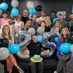 Office team celebrating 25 years
