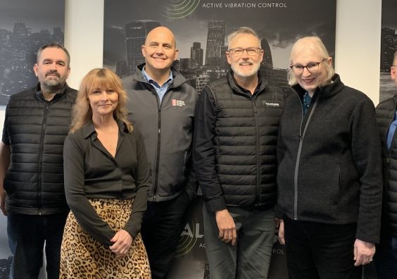  Jason Buck and Sally Basker of Exeter Science Park are pictured with members of the Calmfloor team 