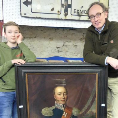 Boy and father with painting