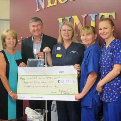 Lyndon, centre left, and Lyne, second left, with members of the Neonatal team