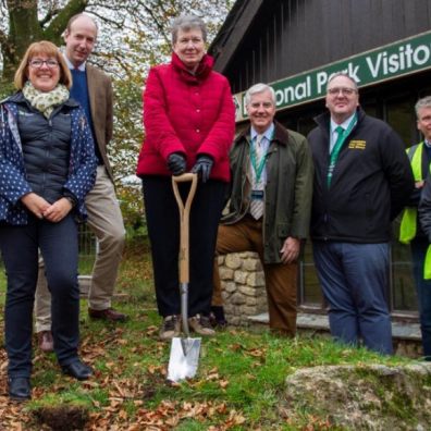  DNPA Chair Pamela Woods carrying out the turf-cutting. L-R: NPS South West Project Manager Claire Walkey, DNPA’s Head of Communications and Fundraising Sam Hill, Duchy of Cornwall’s Land Agent Tom Stratton, DNPA Chair Pamela Woods, DNPA Member Andrew Cooper, DNPA Member Mark Renders, Fifield Construction’s Contracts Manager Sheri Noad, Fifield Construction’s Site Manager David Indge.  