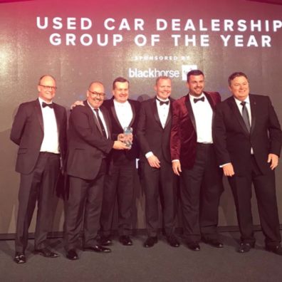 Hendy presented with Used Car Dealership of the Year by Mike Brewer.