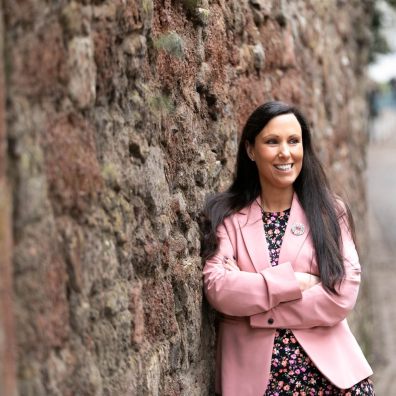 Solicitor standing in relaxed pose