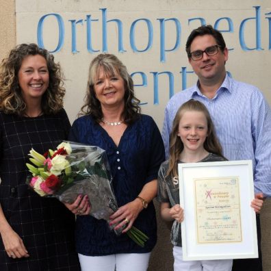 Rhiannon and Michelle with Helen Challinor (left), Advanced Orthopaedic Spine Practitioner, and Oliver Stokes, Consultant Spinal Surgeon 