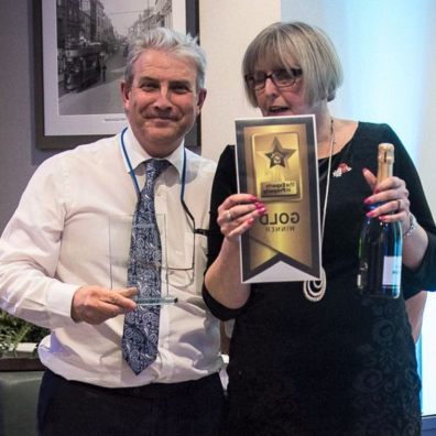 David Gibson and Alison Whitfield, partners of Whitton & Laing, with their Employer of the Year Award.